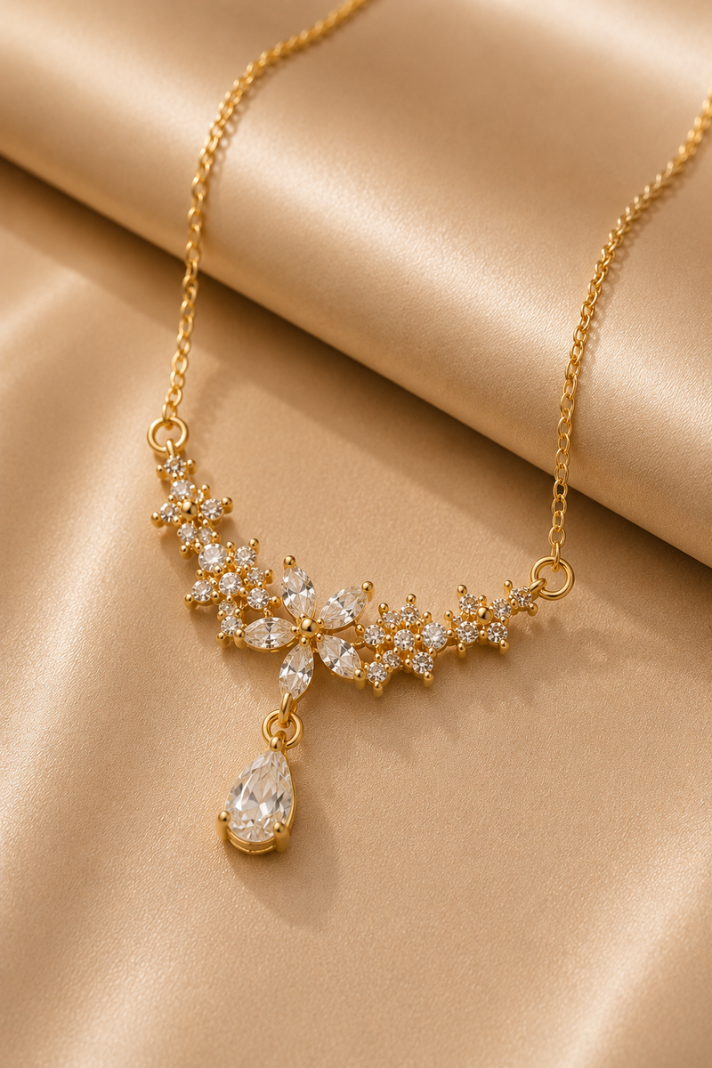Floral Teardrop Pendant, clear cubic zirconia flower cluster in gold-tone stainless steel