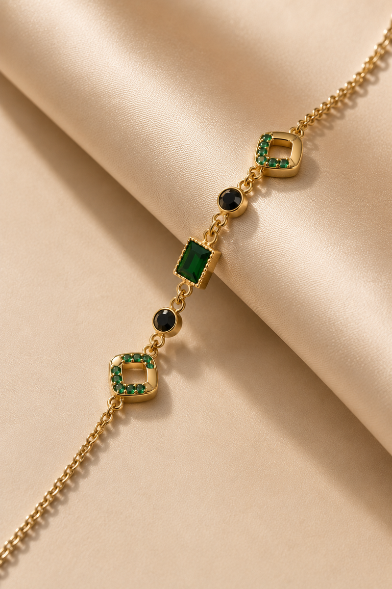 Green Stone Station Bracelet, green cubic zirconia in mixed cuts on a gold-tone chain