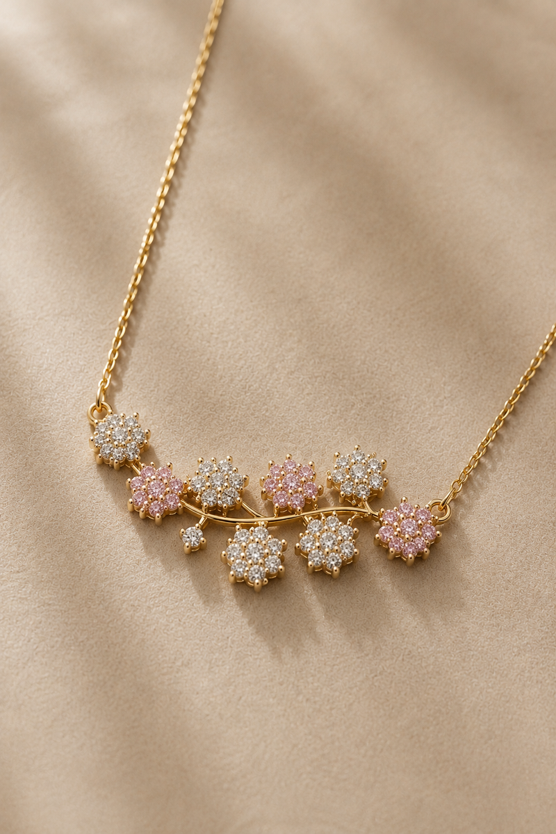 Blush Bloom Necklace, pink marquise-cut stones in a five-petal flower, gold-tone stainless steel