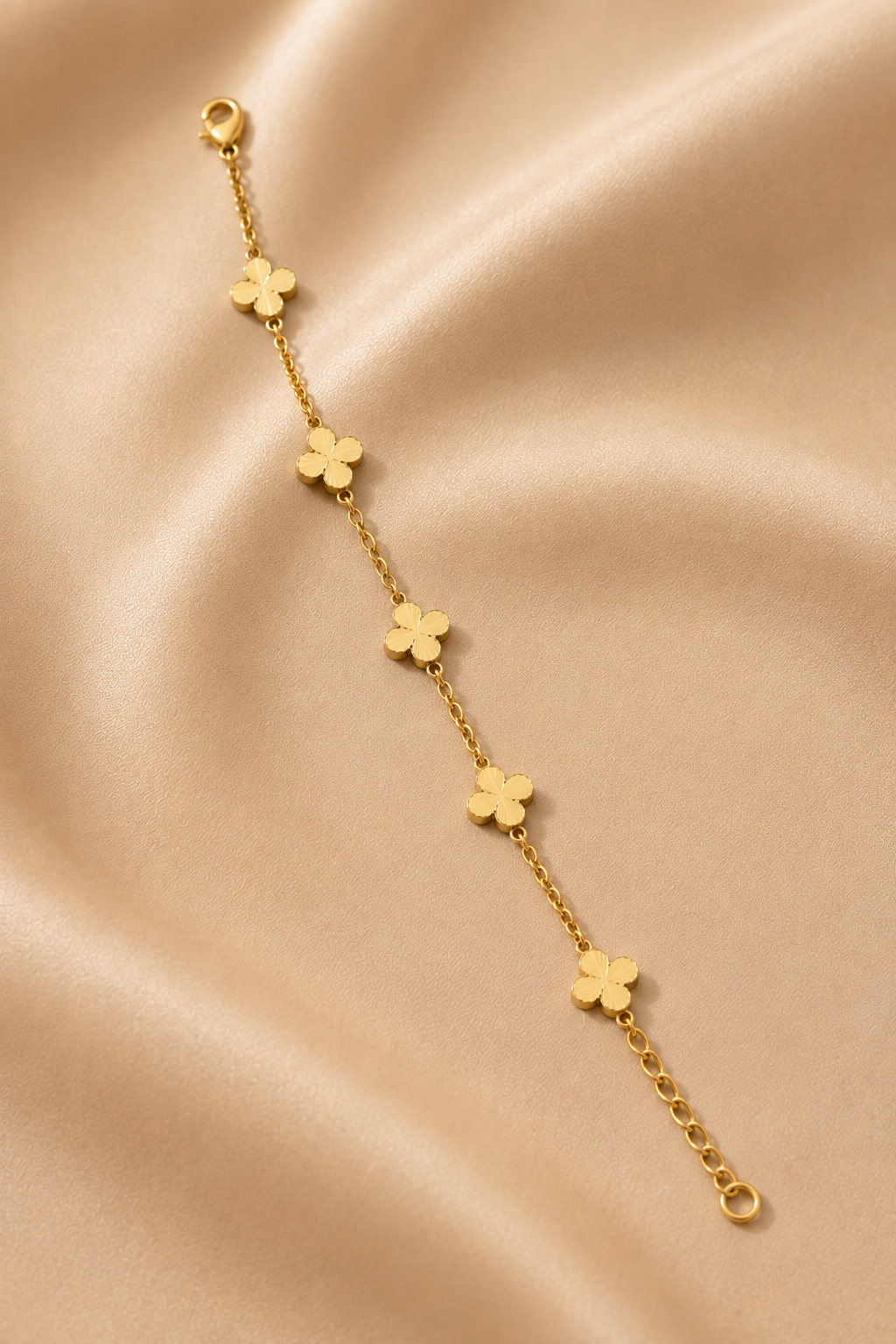 Clovera Charm Bracelet laid flat showing the clasp and adjustable extender
