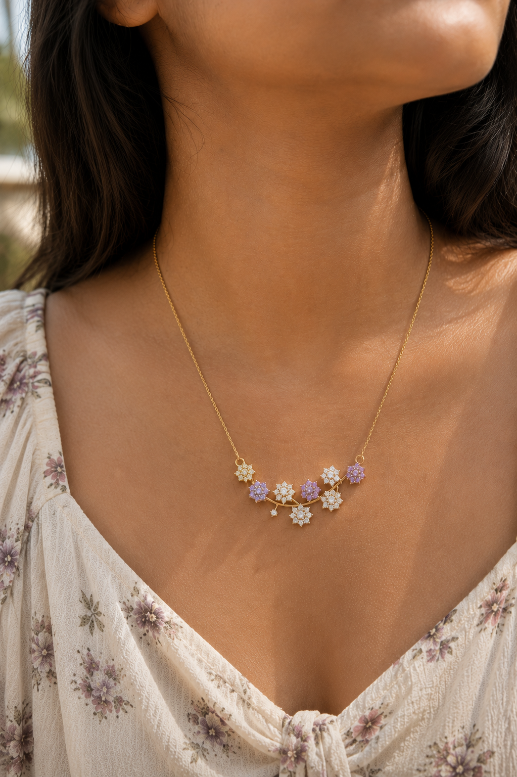 Lavender Bloom Necklace worn at the neck, curved bar of lilac crystal florets