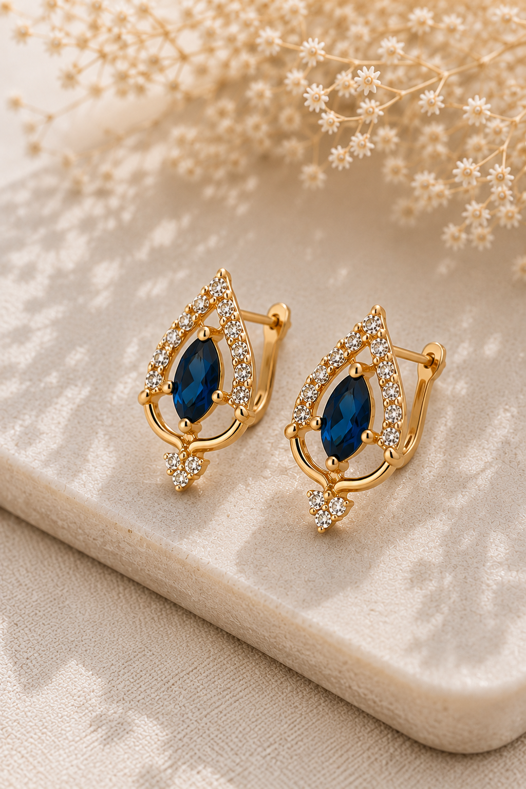 Teardrop Sapphire Gold Earrings, blue marquise stone with a clear crystal halo, gold-tone stainless steel