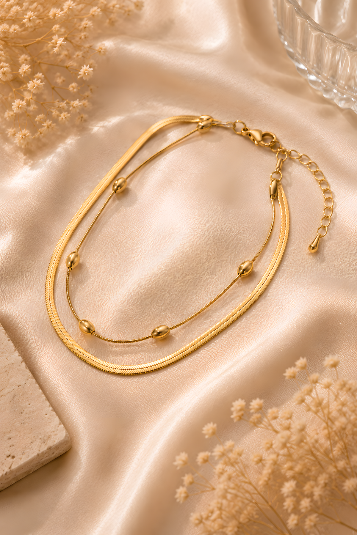 Gold Layered Chain Bracelet laid flat showing both chain textures