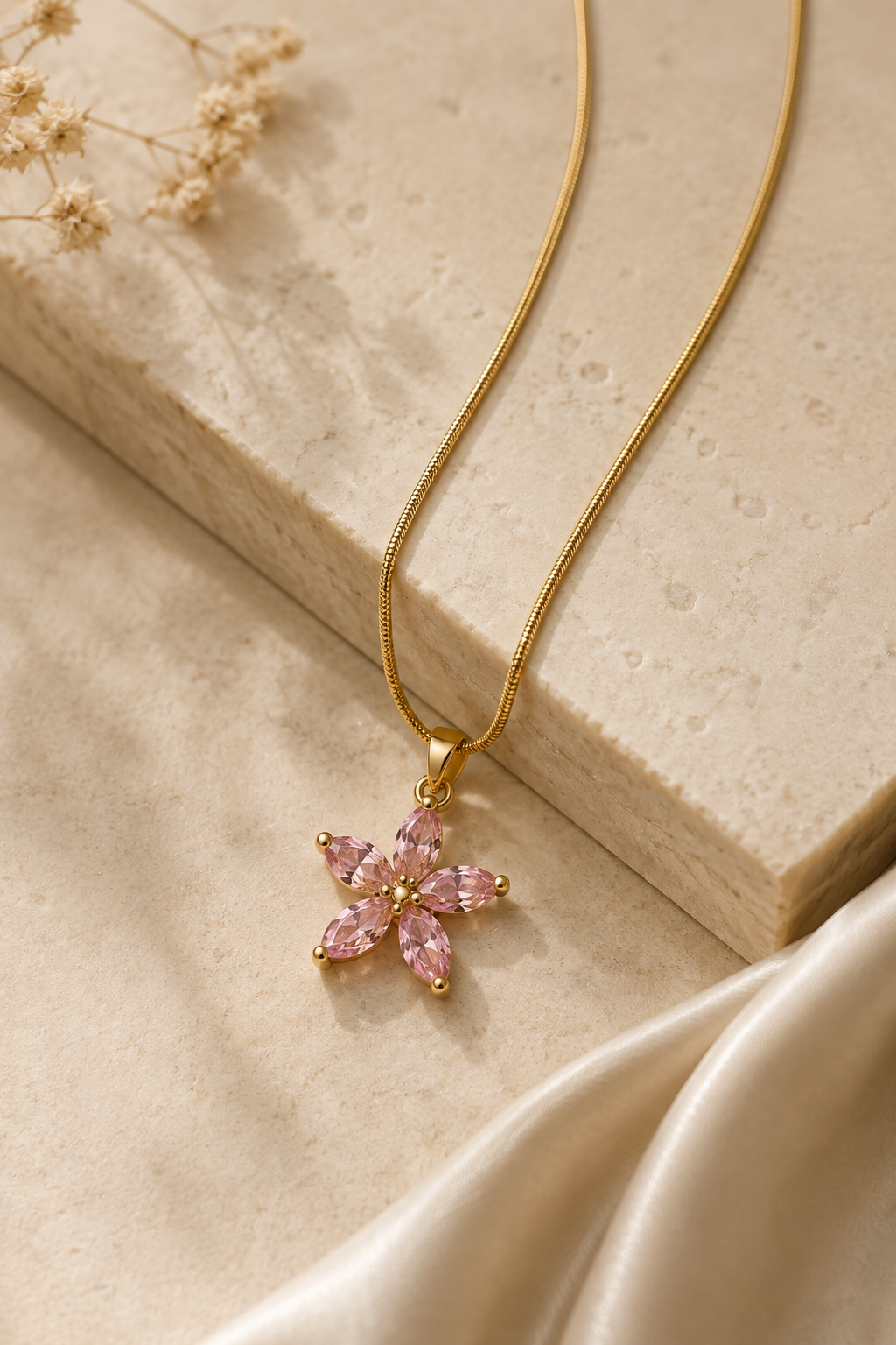 Pink Blossom Necklace shown close up on fabric