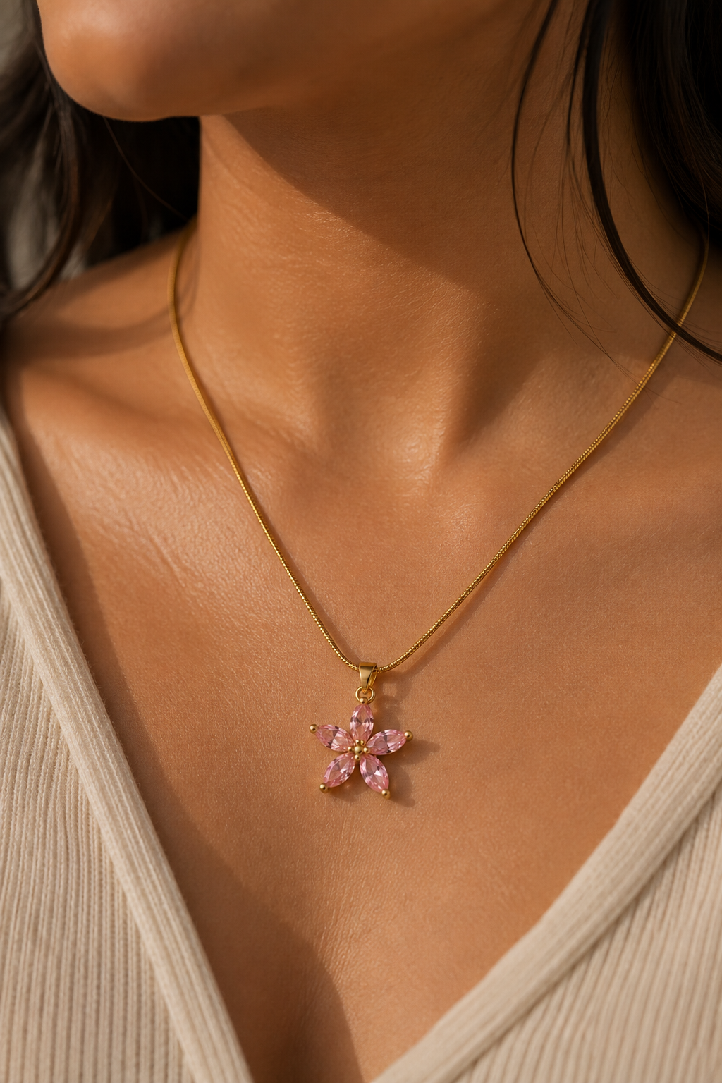 Pink Blossom Necklace worn at the neck, curved bar of pink and clear crystal florets